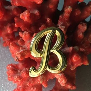 B brooch